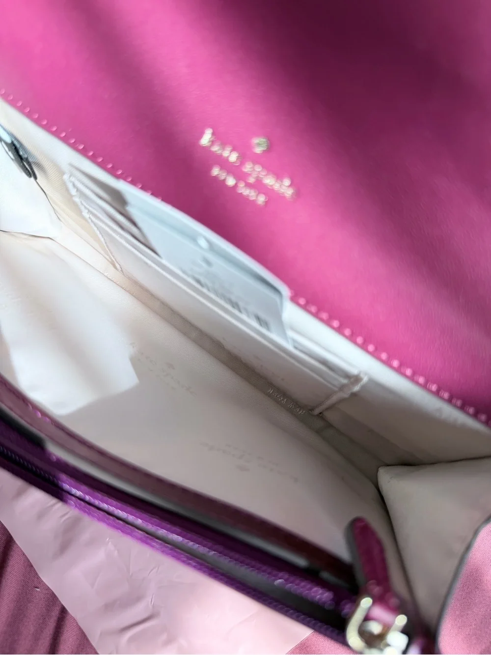 Kate Spade Glossy Magenta Patent Leather Clutch with metal logo plate